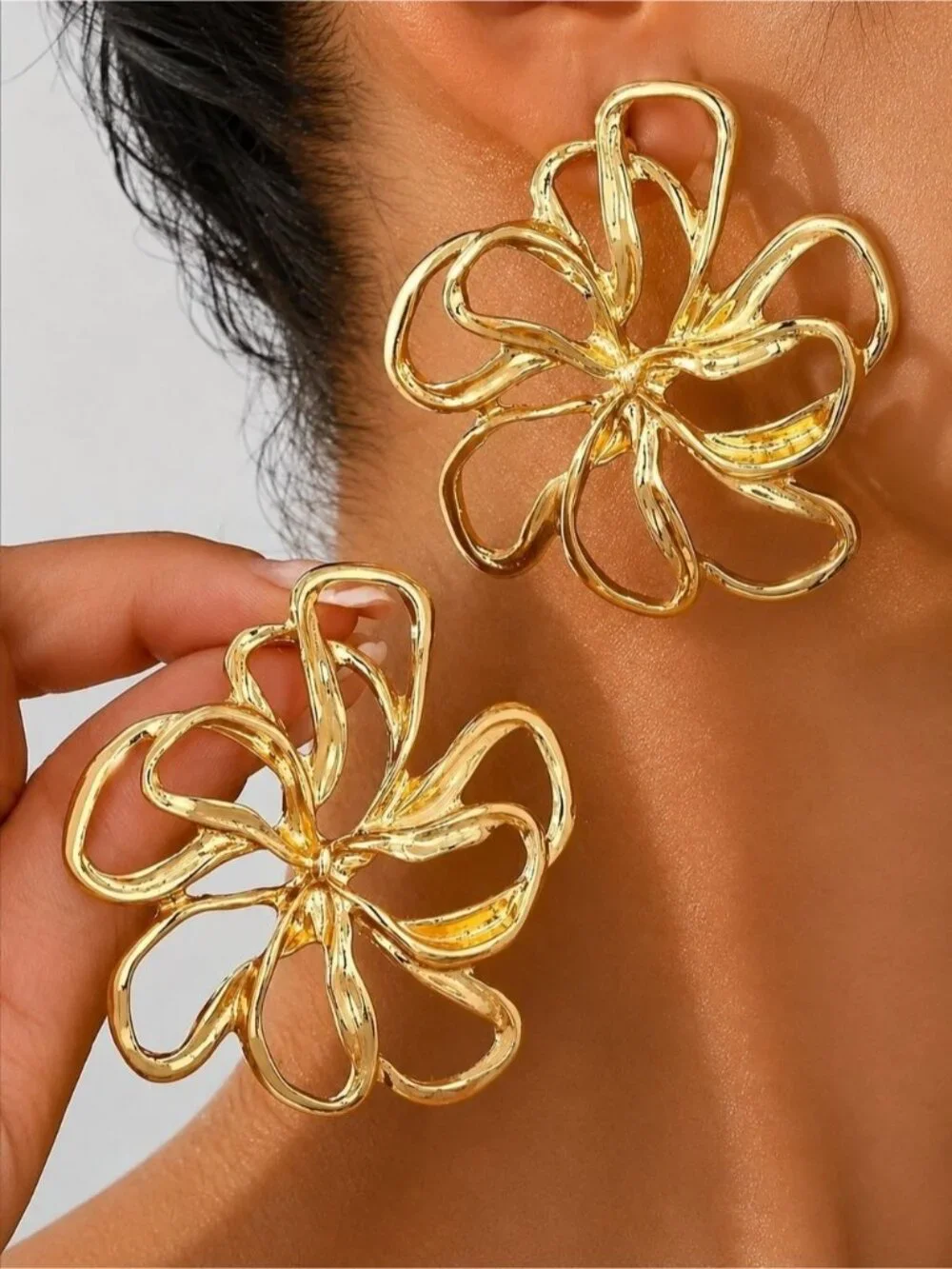 Polished Gold tone Floral Loop Earrings